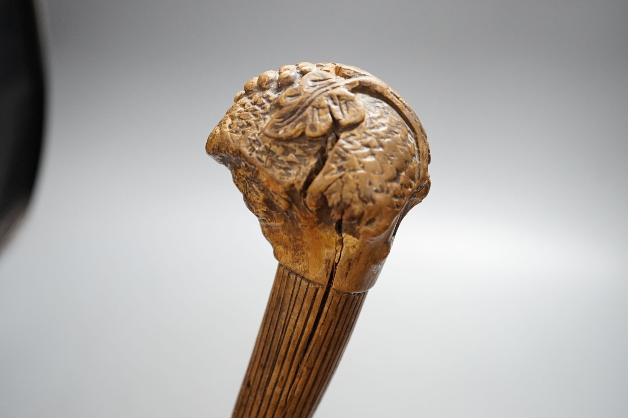 A 19th century folk art walking stick, 89 cms long.